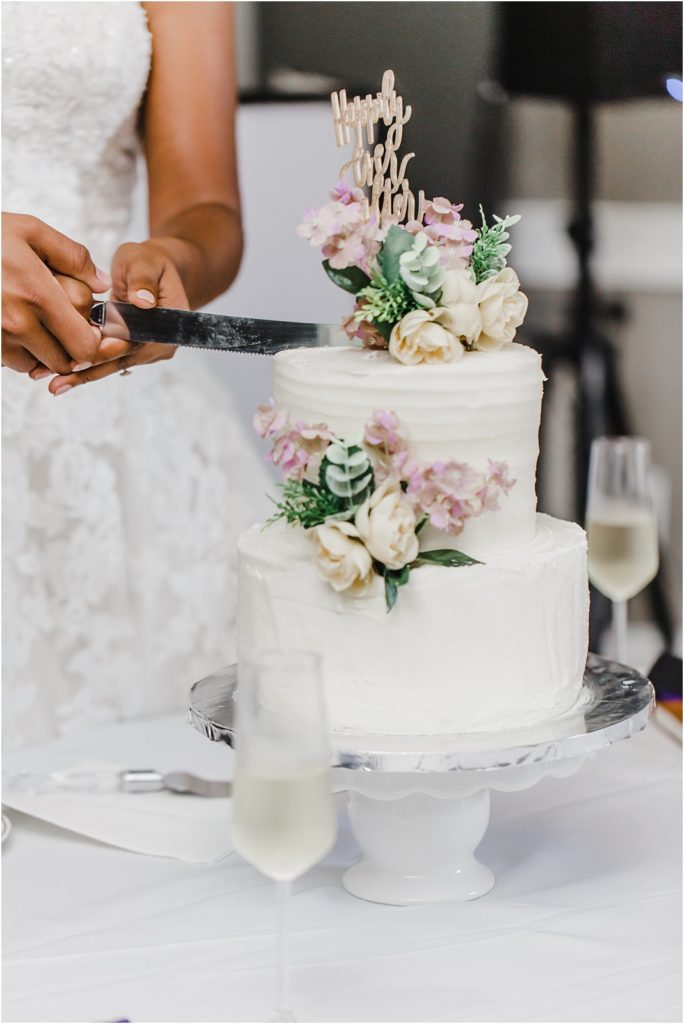 Cutting the cake wedding photos | NC Wedding Photographer